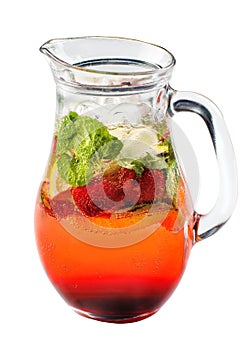 Strawberry lemonade with ice in a glass jug on white isolated background