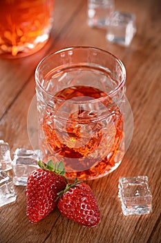 Strawberry liqueur on the table