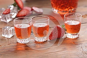 Strawberry liqueur on the table