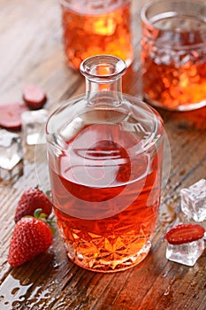 Strawberry liqueur on the table