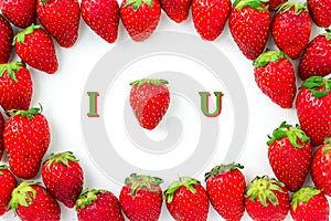 Strawberry look like heart shape, It is mean I LOVE YOU. Group of strawberries are arranged as frame with shadow