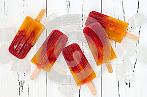 Strawberry mango popsicles - ice pops - paletas. photo