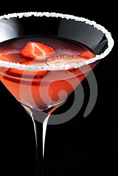 Strawberry margarita cocktails on black background