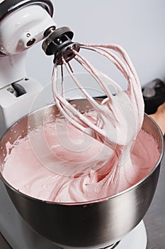 Strawberry marshmallow mass in a mixer