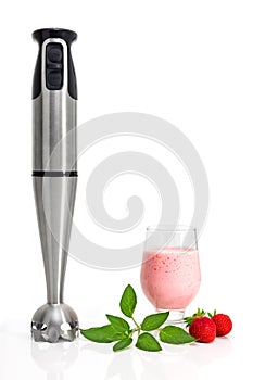 Strawberry milkshake and blender