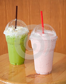 Strawberry milkshake and iced green tea