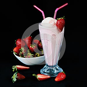 Strawberry milkshake with strawberry syrup decorated with fruit photo