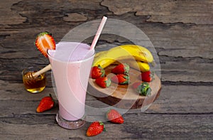 Strawberry mix banana  smoothies red colorful fruit juice milkshake .