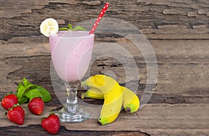 Strawberry mix banana smoothies red colorful fruit juice milkshake blend.