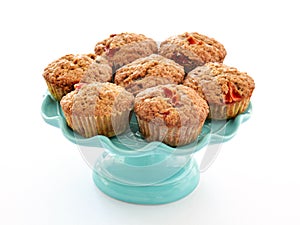 Strawberry muffins on turquoise cake stand
