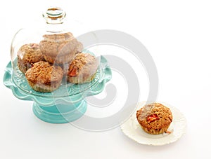 Strawberry muffins on turquoise cake stand