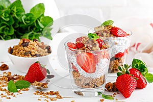 Strawberry parfait with yogurt, homemade granola and fresh berries