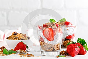 Strawberry parfait with yogurt, homemade granola and fresh berries