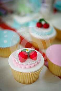 Strawberry fondant cup cakes.