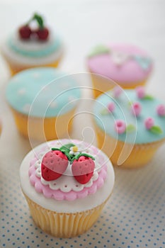 Strawberry fondant cup cakes.