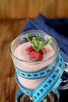 Strawberry protein cocktail decorated with berries and mint