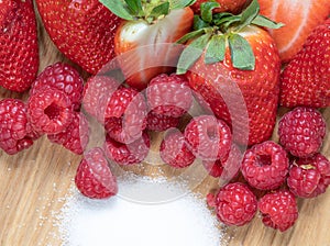 Strawberry. Raspberry. Fruits. Sugar. Macro. Raw. Red