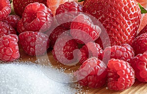 Strawberry. Raspberry Fruits. Sugar. Raw. Macro. Red