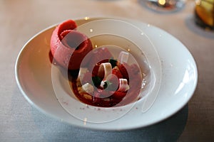 Strawberry and rhubarb premium ice cream with Anjou style cram, luxury dessert unique cuisine in VIP gastronomy restaurant photo