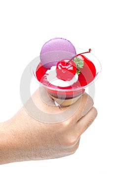 Strawberry shot cake with cherry and macaron