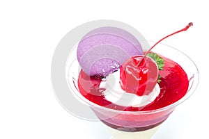 Strawberry shot cake with cherry and macaron