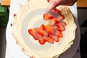 Strawberry Slices on White Cream Cake