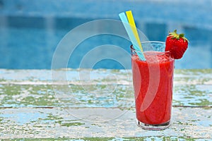 Strawberry smoothie on old rusric turquiose background