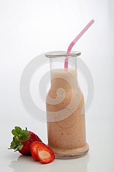 Strawberry smoothie in white background