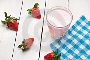 Strawberry smoothie on white background photo