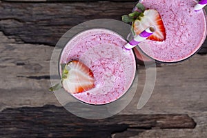 Strawberry smoothies colorful fruit juice milkshake blend beverage healthy .