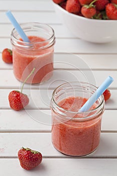 Strawberry smoothies in jam jars