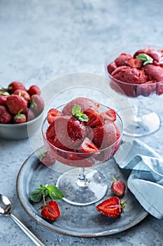 Strawberry sorbet in a glass, vegan  low carb berries ice cream photo