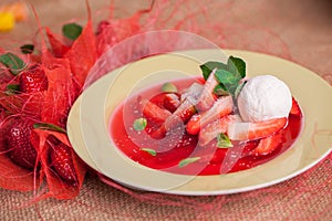 Strawberry soup with mint and ice cream
