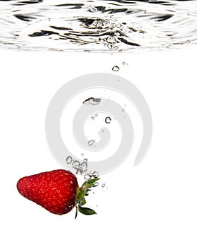 Strawberry splash in water