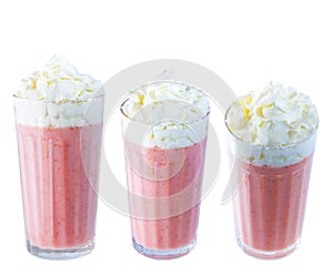 Strawberry and strawberry milk shake with whipped cream, in a glass glass. Isolated object on white background. Photo.