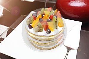 Strawberry Tarts variety fruit pancake silver cake spatula Grand Dessert Buffet in Luxury Restaurant Hotel