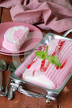 Strawberry vanilla cake roll ice cream with mint