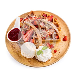 Strawberry waffles whit strawberry sauce and ice cream