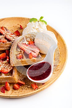 Strawberry waffles whit strawberry sauce and ice cream