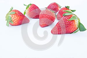 Strawberry on white background fruit& x27;s healthful cordial, useful