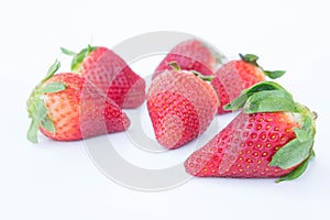 Strawberry on white background fruit& x27;s healthful cordial, useful