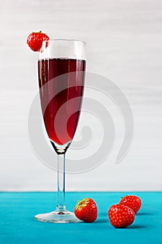 Strawberry wine or juice with berries