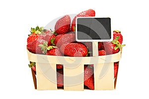 Strawberry in wooden basket with price sign