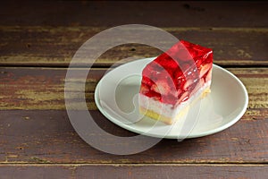 Strawberry Yoghurt In a white plate on dark wooden table
