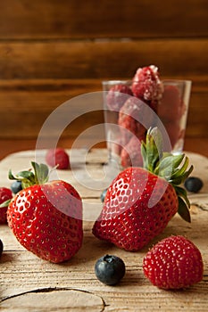Strawberrys Blueberrys and Strawberrys on wood background studio Shot