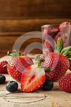 Strawberrys Blueberrys and Strawberrys on wood background studio Shot