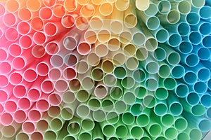 Straws background in rainbow colors photo