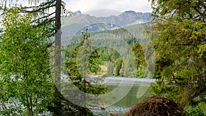 Strbske pleso. High tatras mountains. Vysoke tatry. Autumn forest. Reflection in lake. Beautiful landscape. Slovakia.