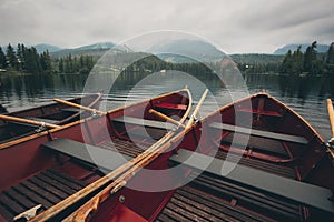 Strbske Pleso lake with boats in High Tatras.