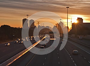 Stream of cars traveling on a busy highway